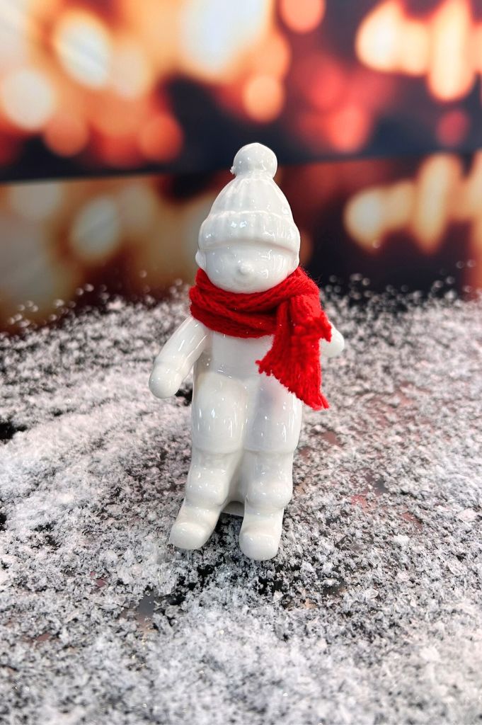 D7 Deko Kind Antea auf Schlitten creme-weiß