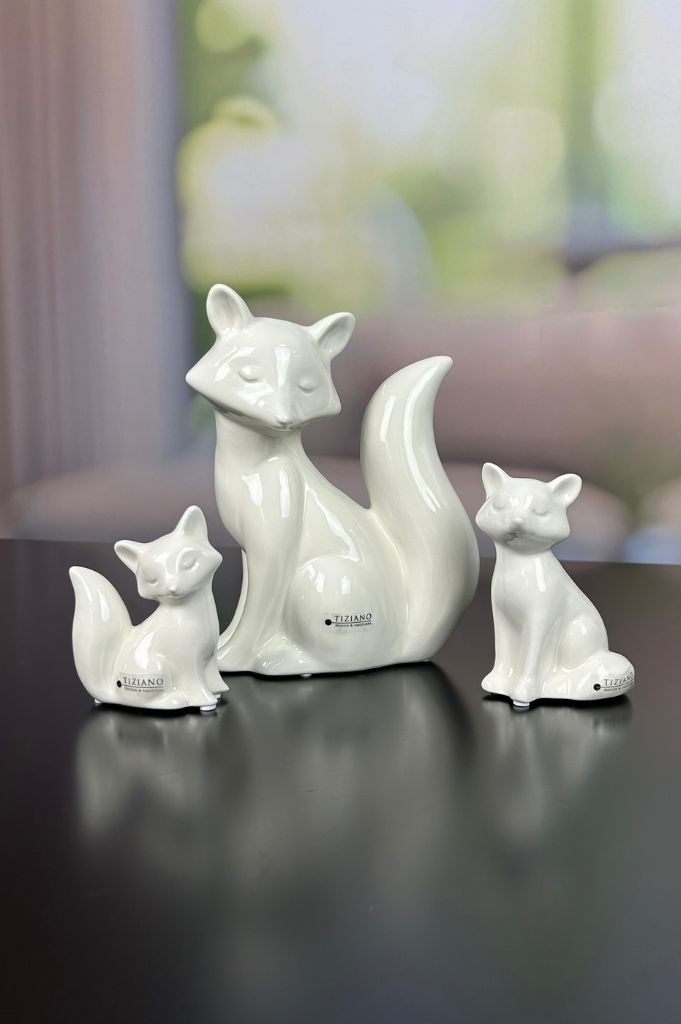 Fuchskind Roxy sitzend 10 creme-weiß