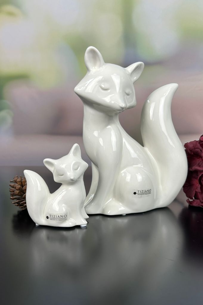 Fuchskind Roxy sitzend 10 creme-weiß