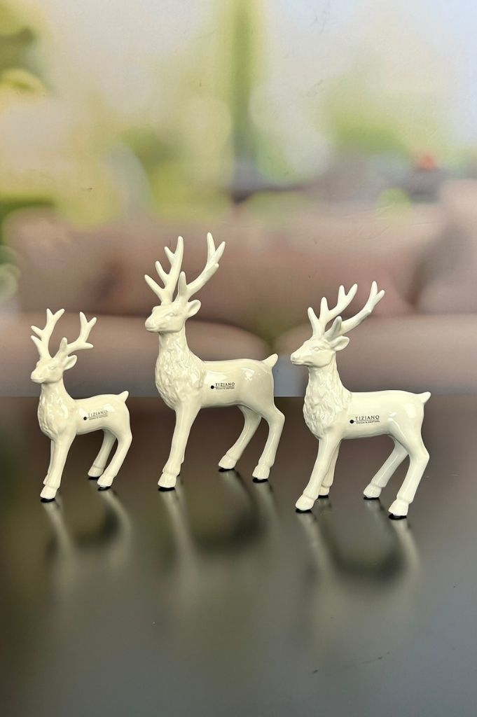 Deko Hirsch Robin stehend creme