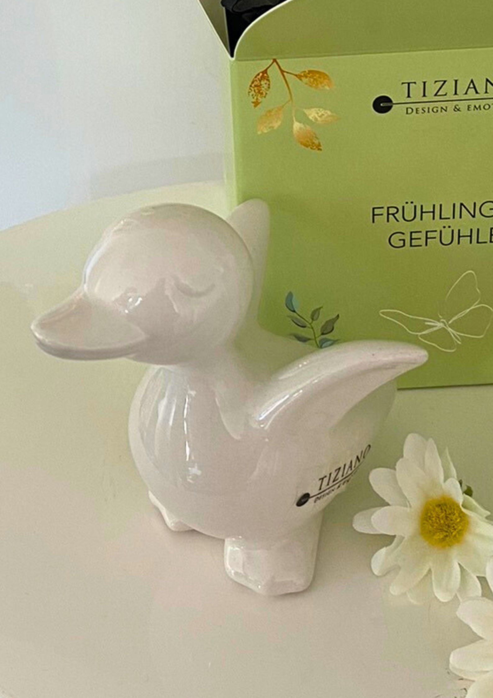 Würfelbox grün mit Ente Daffy creme-weiß
