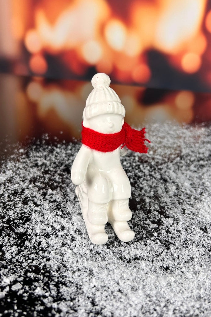 Deko Kinder Antea auf Schlitten mit Schal creme-weiß
