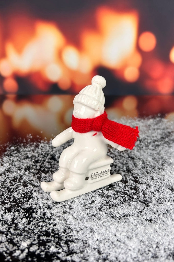 Deko Kinder Antea auf Schlitten mit Schal creme-weiß