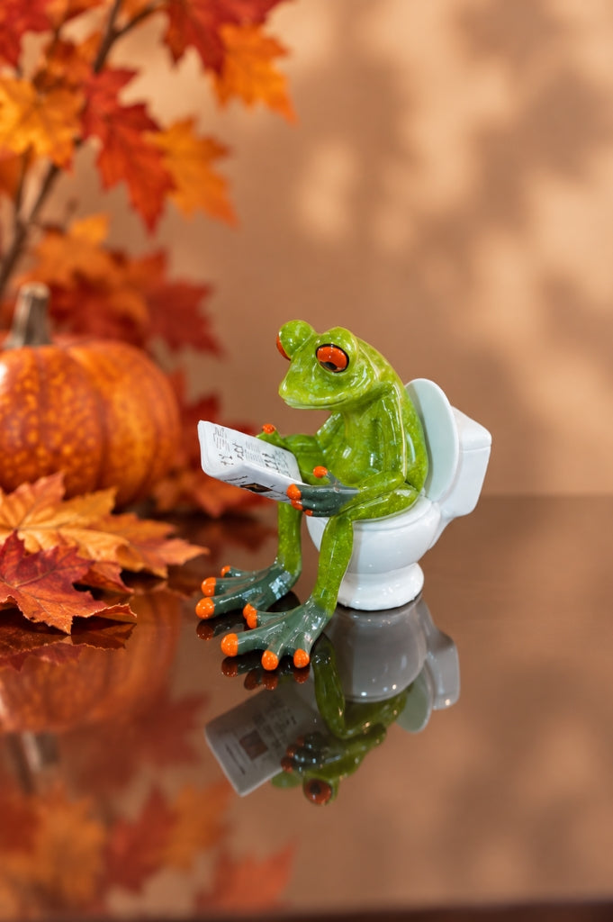 Deko Frosch Fridolin hellgrün auf WC mit Zeitung
