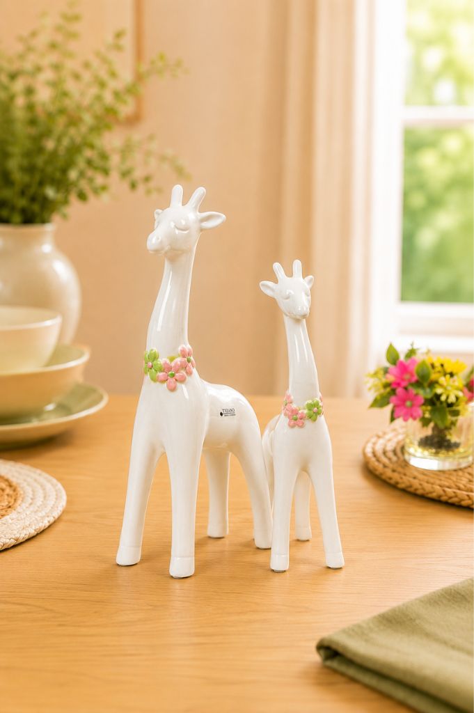 Deko Giraffe Giulia mit Blütenkranz rosa-grün