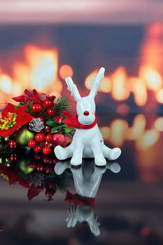 Deko Rentier Rudolph sitzend creme-weiß